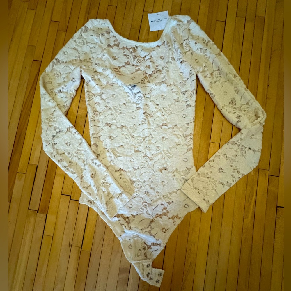 American Eagle, Cream long sleeve lace bodysuit with low back. Size XS.